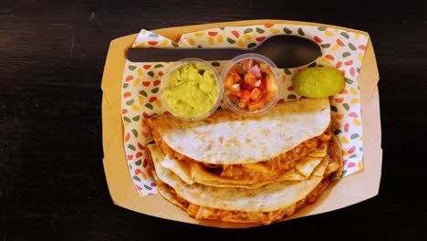 gringas tacos served with guacamole and salsa on the table