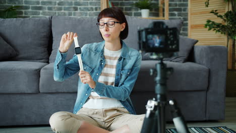 woman reviewing a smart watch