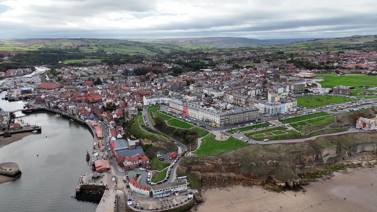 Aerial drone view Whitby Abbey north yorkshire british english seaside port harbour town city england uk