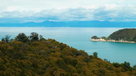 abel tasman: island beauty with a distant peninsula