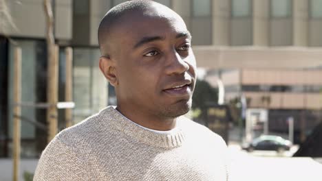 closeup view of confident man talking to friends