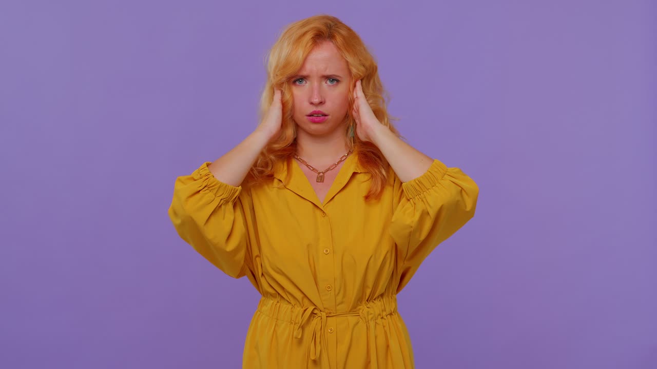 Frustrated irritated girl covering ears, avoiding advice ignoring unpleasant noise loud voices