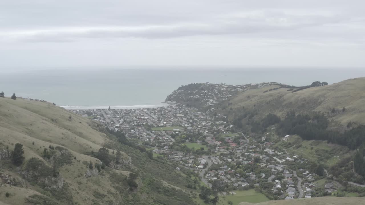 Aerial View of a Coastal Town Nestled in a Valley