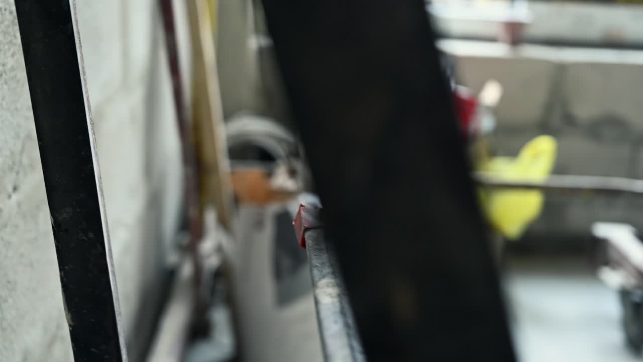 Slide shot of an interior under construction. Ladder on foreground