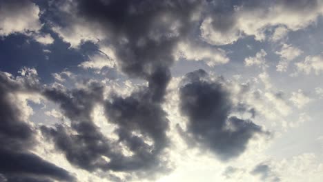 skyscape with dark cumulus clouds