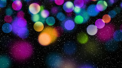 nieve cayendo con círculos de navidad de luz bokeh