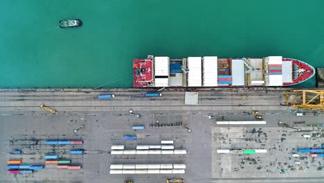 shipping container terminal at daytime in puerto limon, caribbean, costa rica - aerial top down