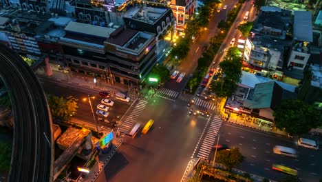 4k.time lapse traffic at intersection bangkok thailand