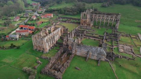 revealing tracking aerial over rievaulx abbey in north york england