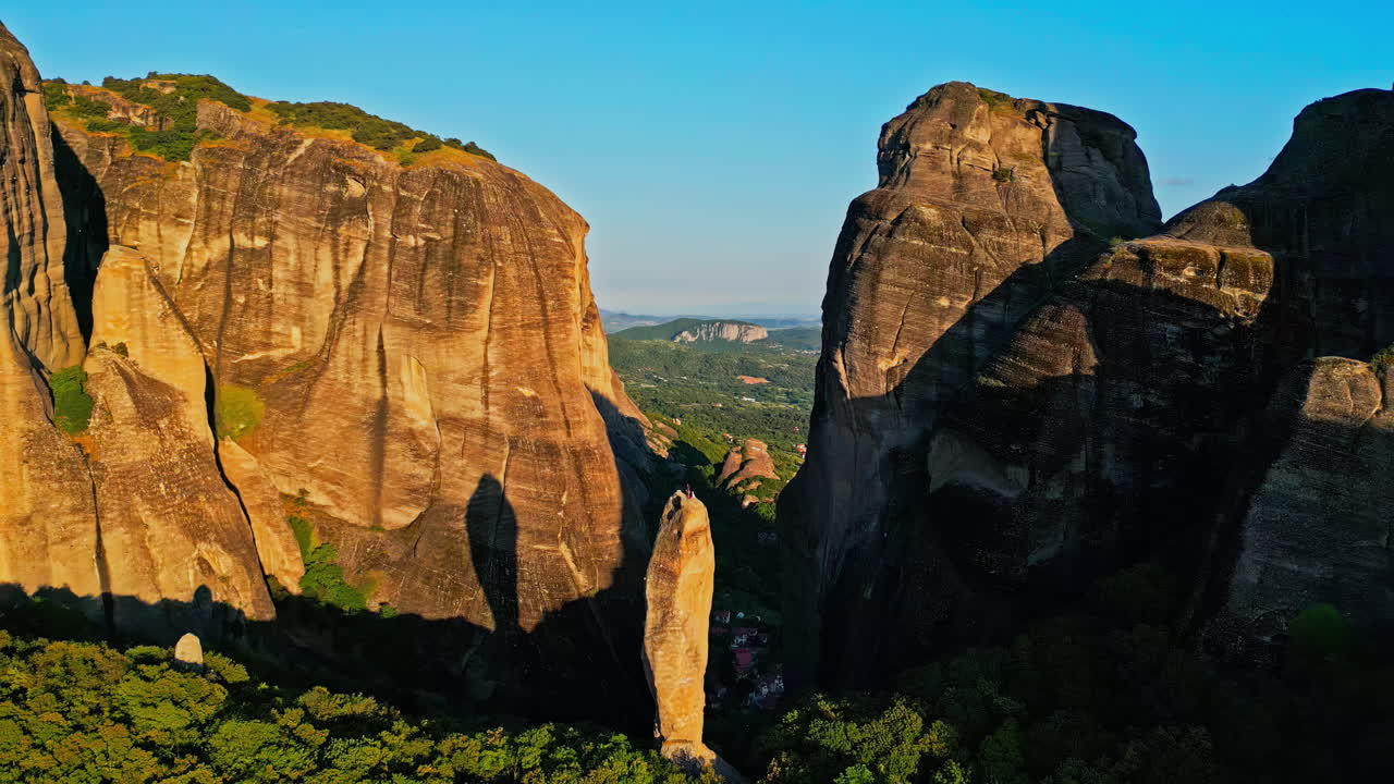 Meteora Landscape with Towering Rock Pillars at Golden Hour