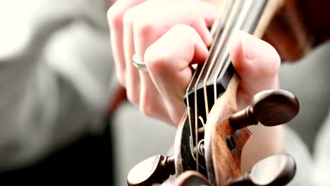 violinist playing - closeup of her hands