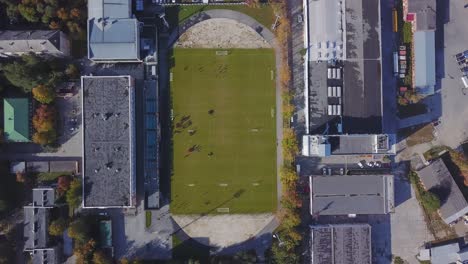 aerial view of a football field in a city