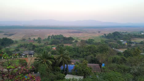 view from mountains empty crop farm field wide bird eye view alibag