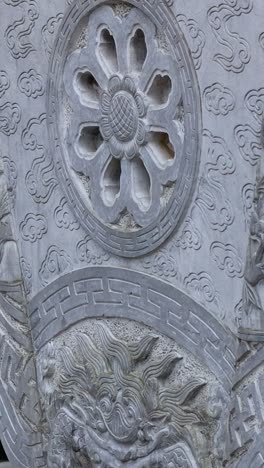 intricate carvings on a historical stone structure