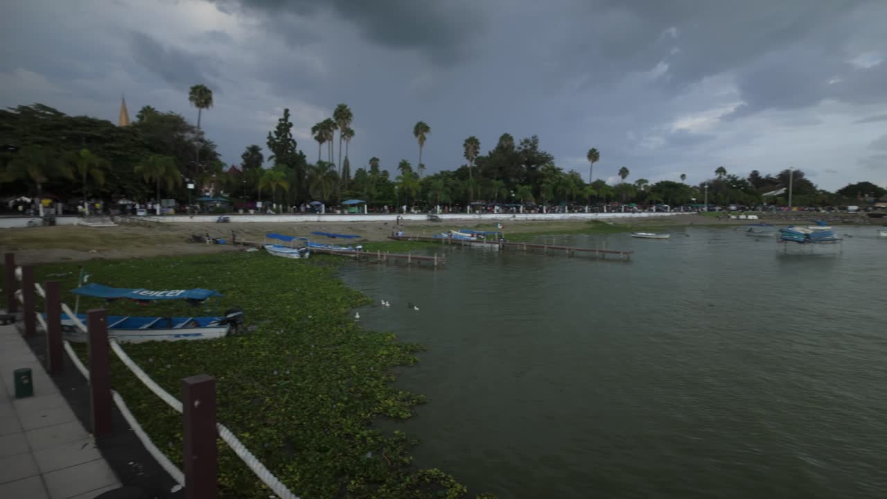 Panorama Of Lake Chapala From Rinconcito de Amor On Cloudy Day In Chapala, Jalisco, Mexico. panning shot