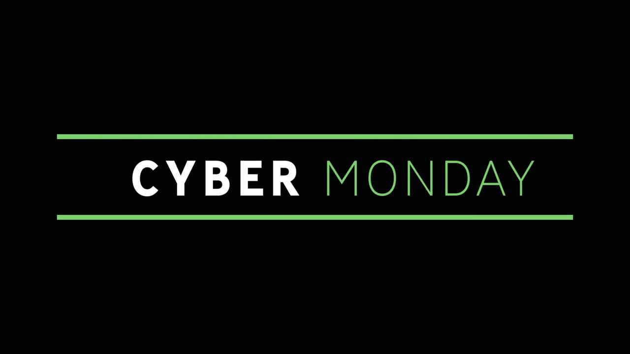 texto blanco y verde de cyber monday que aparece contra una pantalla negra