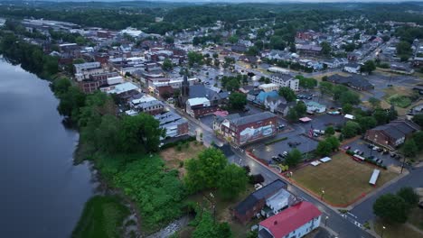 Susquehanna-River-and-downtown-Milton,-Pennsylvania-with-drone-video-moving-in