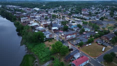susquehanna river and downtown milton, pennsylvania with drone video moving in