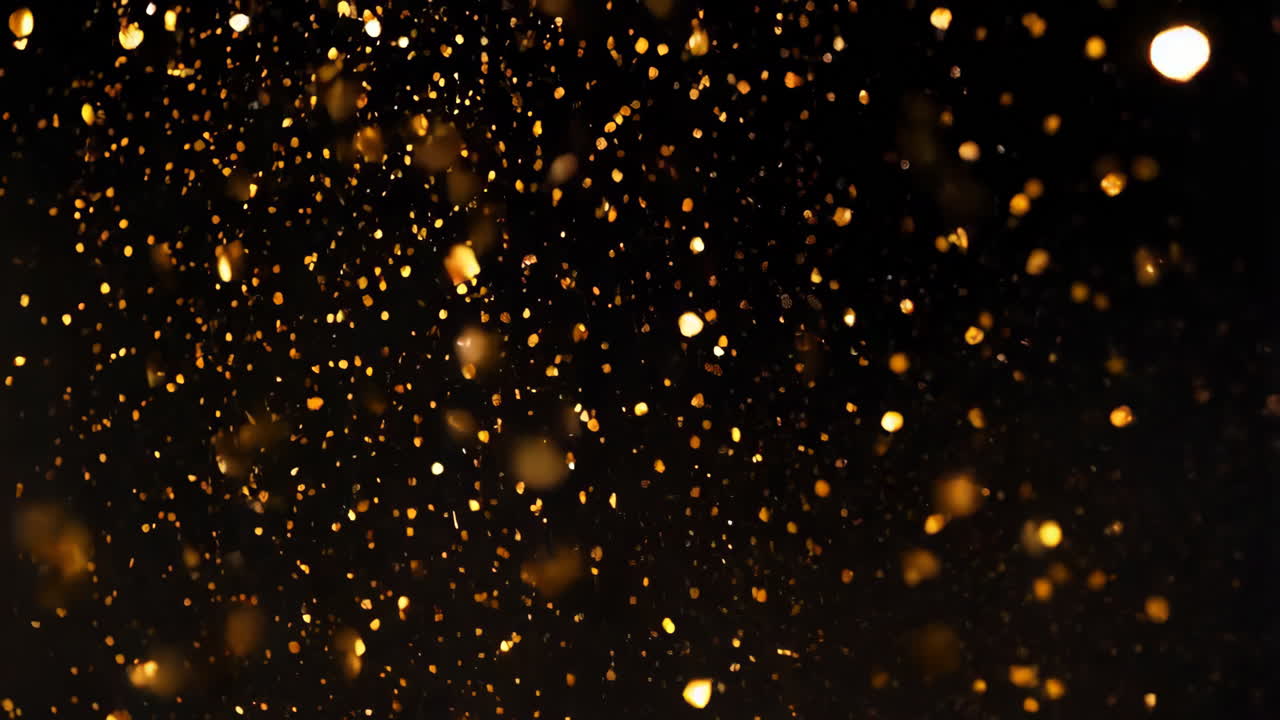 Golden Glitter Particles on Black Background | Premium Stock Video Footage