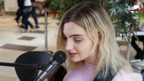 close up establishing shot of female musician - rebekah kirk