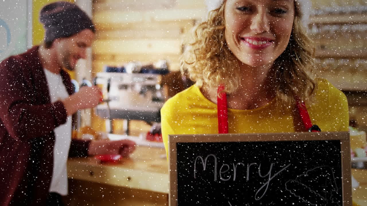 composición de video con nieve cayendo sobre una chica feliz en un café con saludos a bordo
