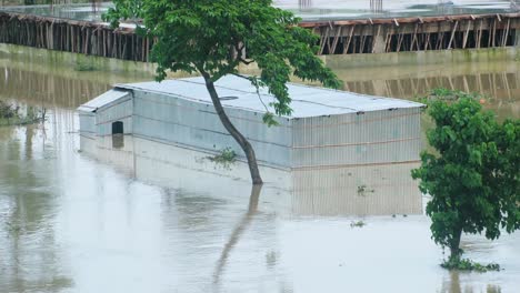 Flooded Area with Damaged Building