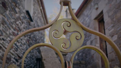 four legged triskel decoration in a well in o cebreiro galicia slow motion