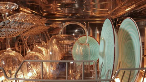 open dishwasher with clean dishes. housekeeping concept