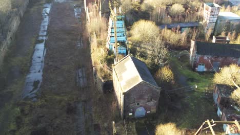 abandoned run down staffordshire historical industrial coal mine buildings aerial view