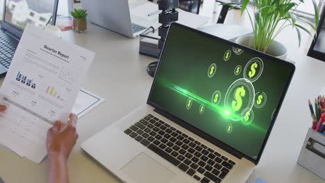 African-american-businesswoman-using-laptop-for-video-call-with-data-processing