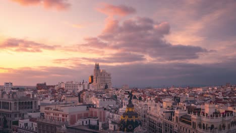 madrid gran via skyline during cloudy sunset timelapse day to night