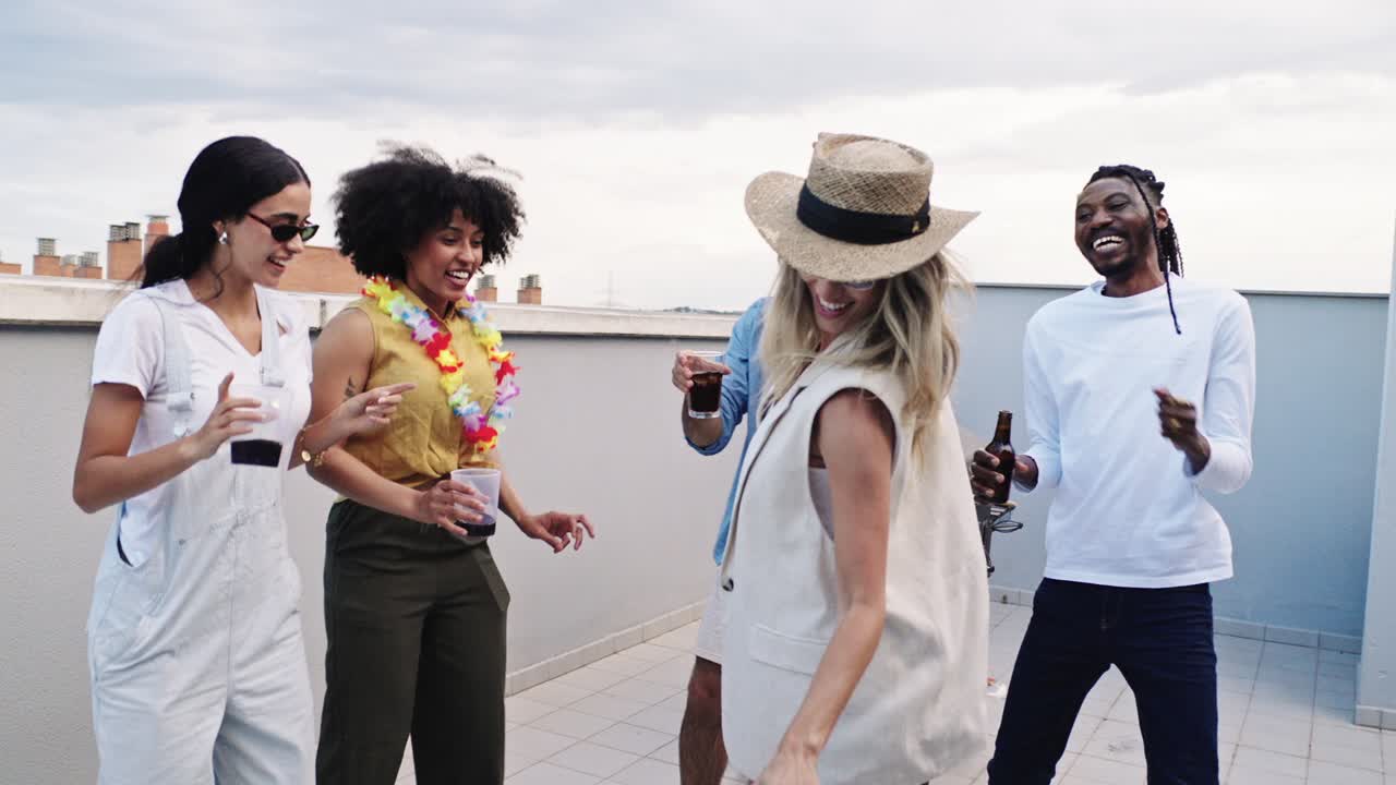 Group of friends having a rooftop party
