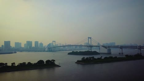 rising on rainbow bridge at day time over water