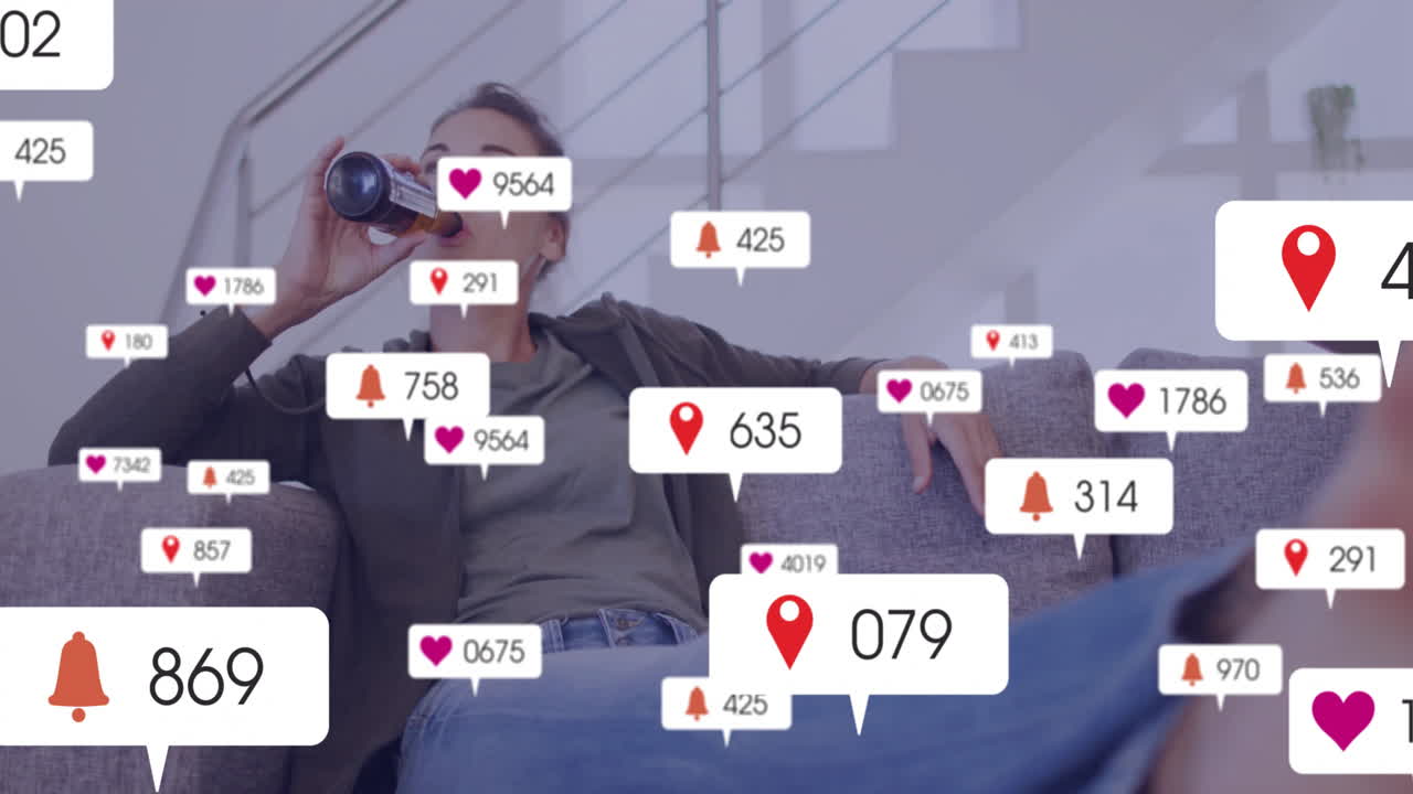 Relaxing on sofa, person receiving animation of social media notifications