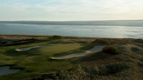 Stunning-aerial-shot-of-the-Prouts-Neck-golf-course-on-the-coast-of-Scarborough,-Maine