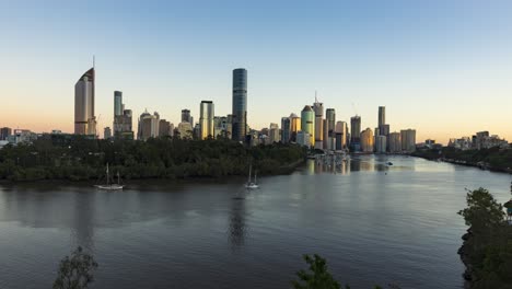 golden hour time lapse of brisbane city and river at sunrise