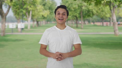 happy indian man smiling to the camera