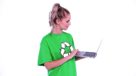 young blonde environmental activist using her notebook