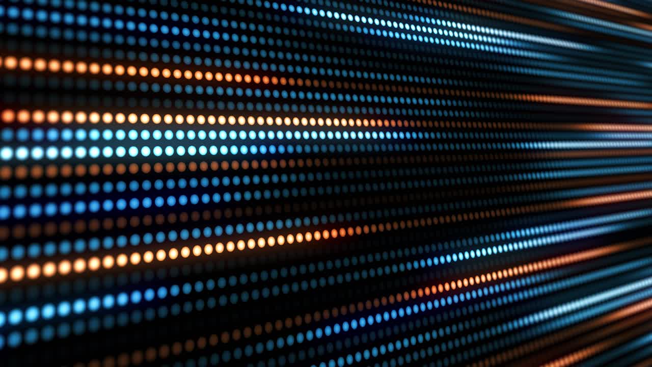 Dynamic animation of colorful circles creating a flowing motion effect with a shallow depth of field