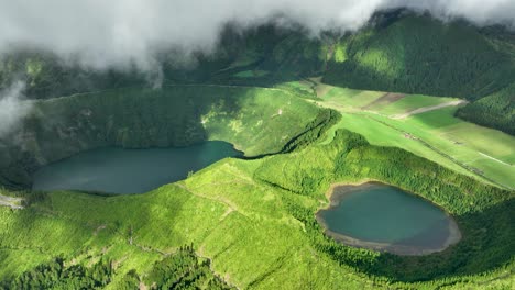 cinematic drone shot from clouds of rasa and santiago lagoons at sete cidades