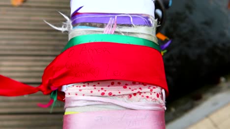 colorful bands written with names as a sign of friendship in ponte laços de amizade, aveiro