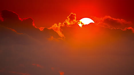 intense red fiery sky timelapse with clouds revealing a perfect circle sun