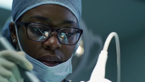 dedicated surgical professional operating in a sterile environment, focused on precision and patient care during a critical medical procedure