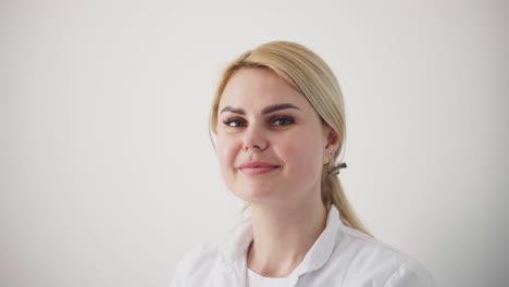 hardware procedure in cosmetology. peeling, phonophoresis, massage and facelift in a beauty clinic. cosmetologist smoothes wrinkles with microcurrent.
