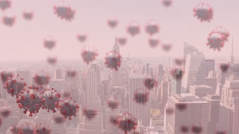 Animation-of-covid-19-cells-floating-over-cityscape-on-pink-background