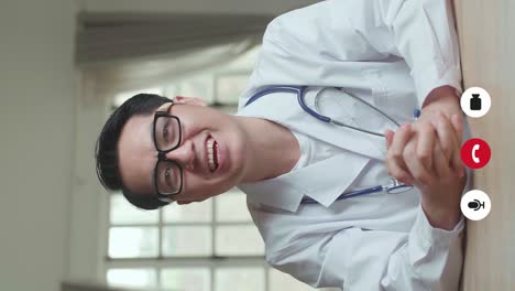male doctor talking to camera and consult client online, video in 4k