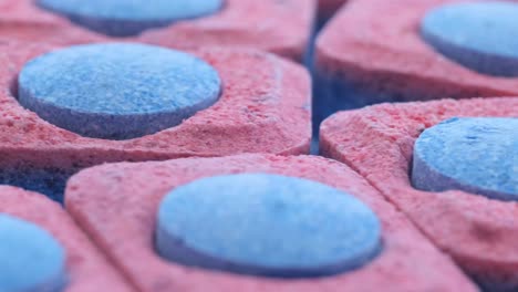 macro video background with dishwasher capsules dishwashing concept