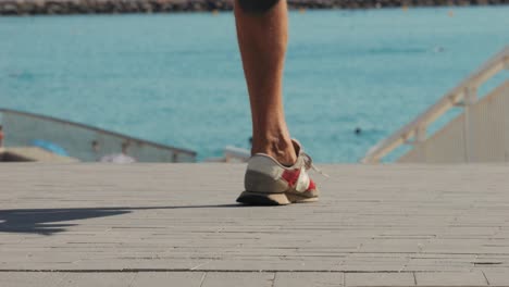 Man Jumping Rope by the Sea