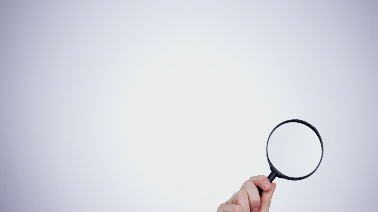 lupa, mano y investigación