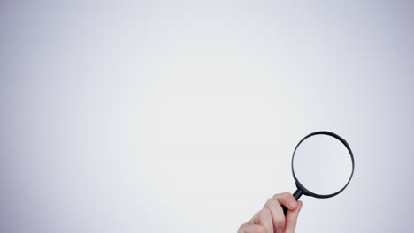 lupa, mano y investigación